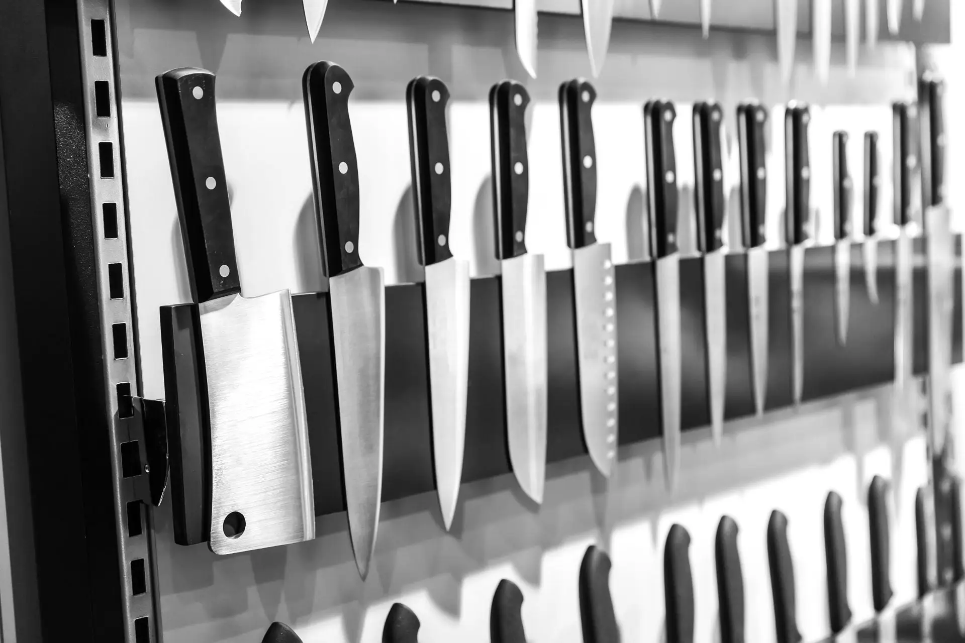 Kitchen knives on a magnetic holder Sharper Focus Ltd postal sharpening service